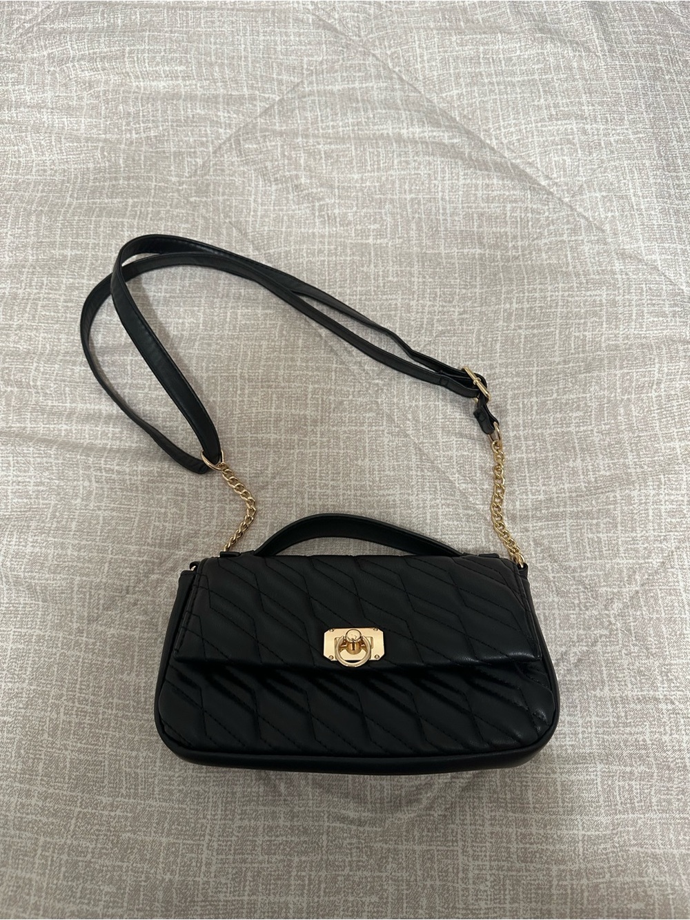 Black Quilted Crossbody Bag with Gold Hardware